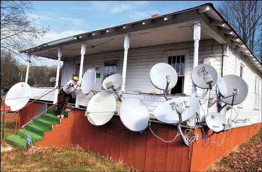 Al Jessup, his satellite dishes and 5,000 channels